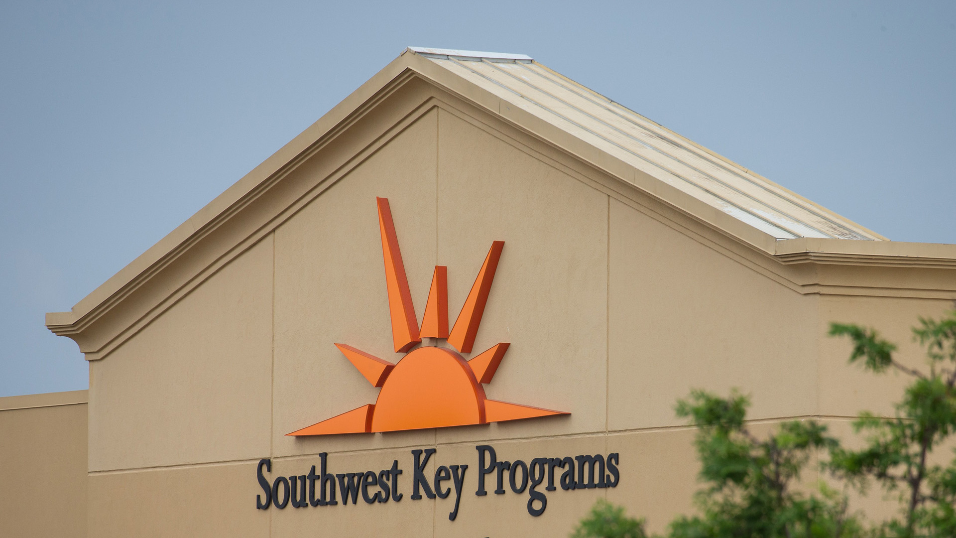 A sign for Southwest Key is seen at a former Walmart Supercenter now being used as a migrant children's shelter on June 18, 2018 in Brownsville, Texas. (Credit: LOREN ELLIOTT/AFP/Getty Images)