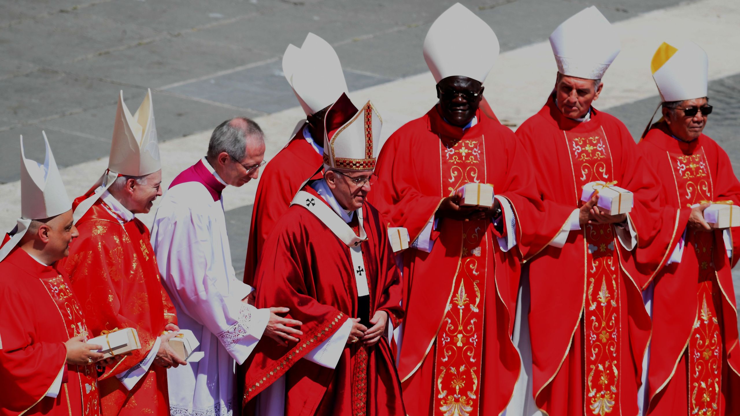 Pope Francis speaks with new Cardinals during the solemn mass to celebrate the feast of Saint Peter and Saint Paul on June 29, 2018, in Saint Peter's square at the Vatican. (Credit: TIZIANA FABI/AFP/Getty Images)