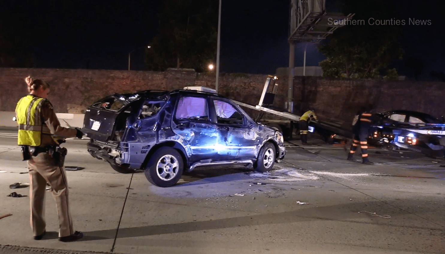 Officials respond to a crash on the northbound 5 Freeway in Anaheim on Aug. 5, 2018. (Credit: Southern Counties News)