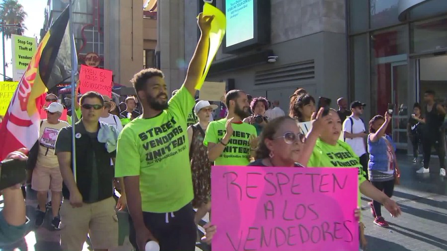 Street vendors rally against citation enforcement on Hollywood on Aug. 7, 2018. (Credit: KTLA)