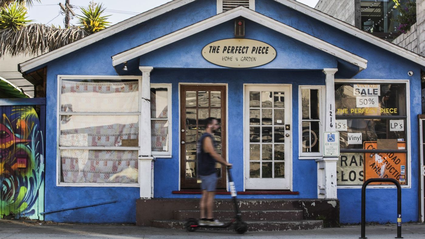 The Perfect Piece, shown in an undated photo, is one of many businesses that have not allowed Bird scooter parking or riding in front of their stores. (Credit: Maria Alejandra Cardona / Los Angeles Times)