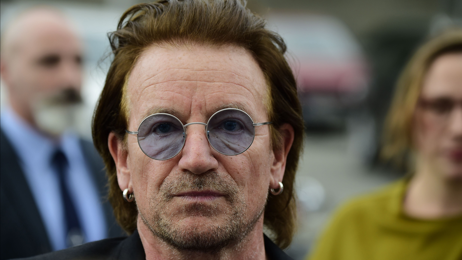 U2 lead singer Bono is pictured after a meeting with the German Chancellor in Berlin on August 28, 2017. (Credit: TOBIAS SCHWARZ/AFP/Getty Images)