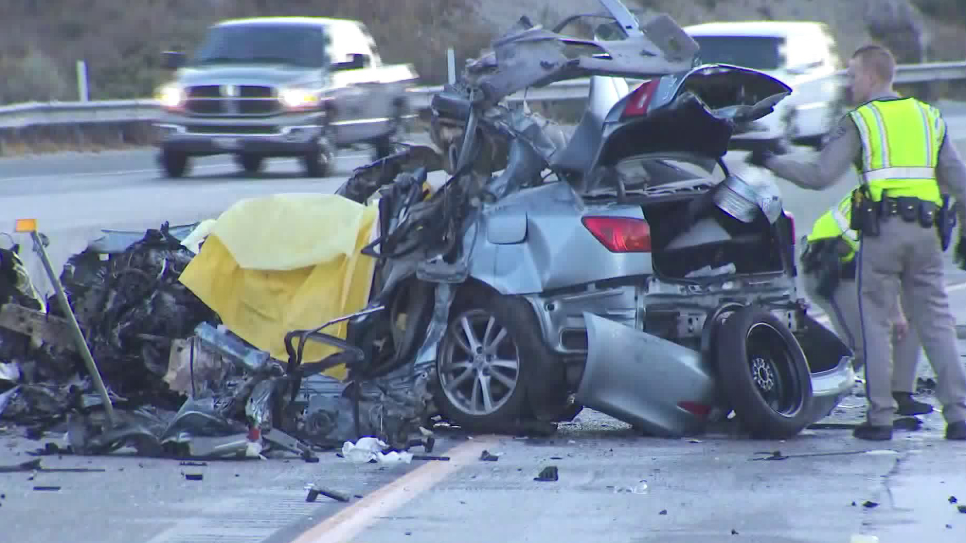 A mangled vehicle is seen following a crash on the 14 Freeway near Agua Dulce on Sept. 30, 2018.