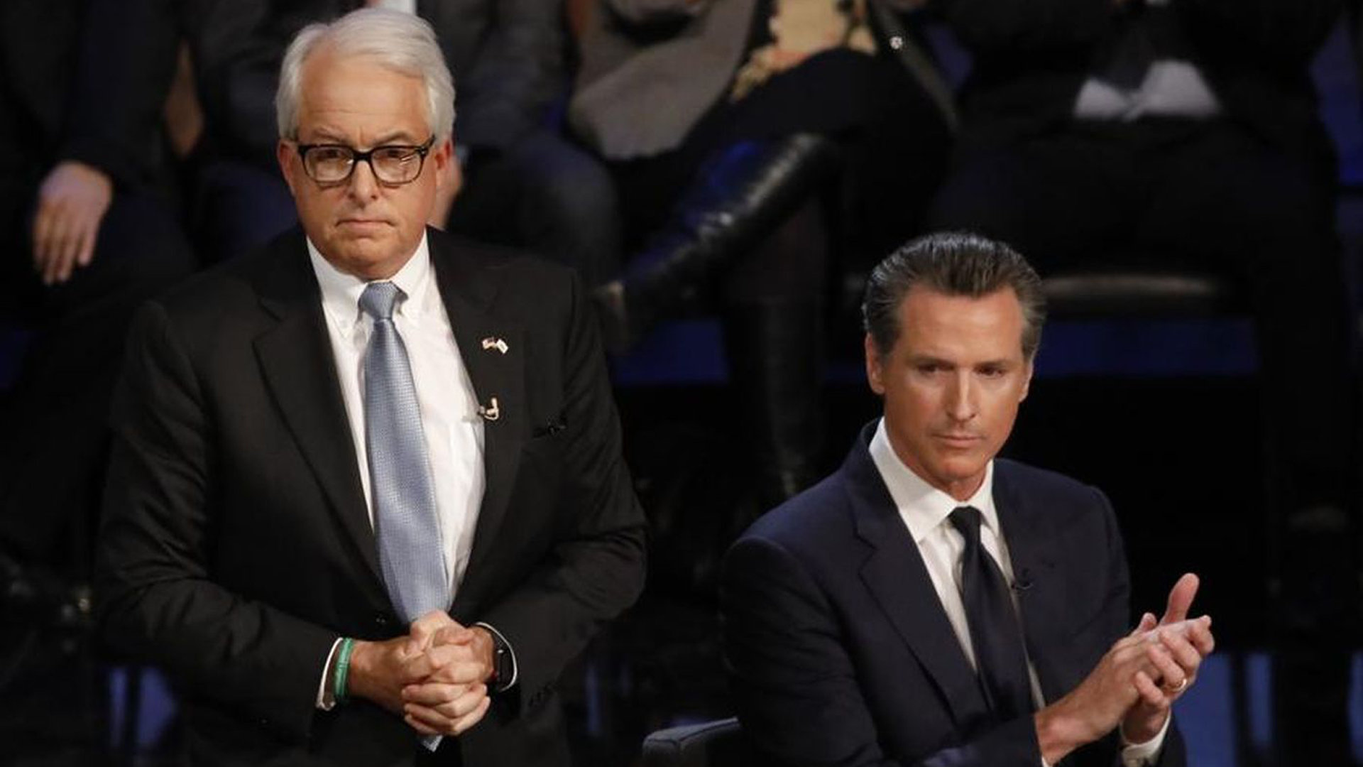 Gubernatorial candidates John Cox, left, and Lt. Gov. Gavin Newsom are seen before a debate at UCLA in January 2018. (Credit: Genaro Molina / Los Angeles Times)