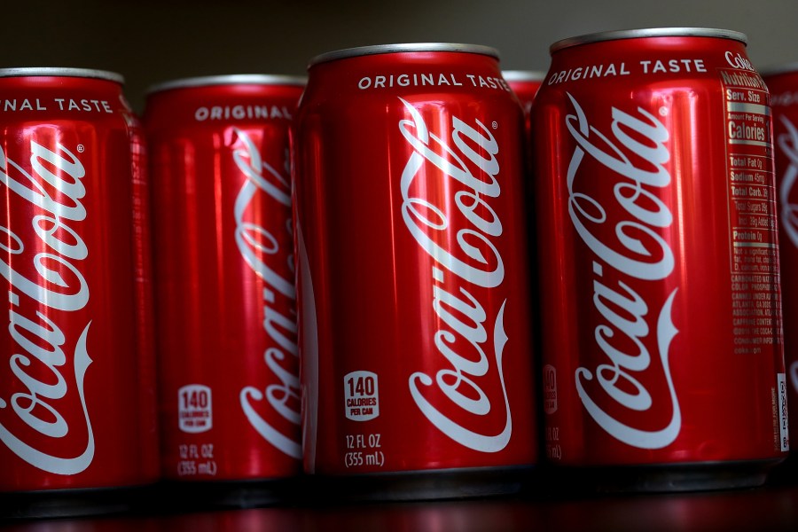 Cans of Coca Cola are displayed on July 25, 2018, in San Rafael, Calif. (Credit: Justin Sullivan/Getty Images)