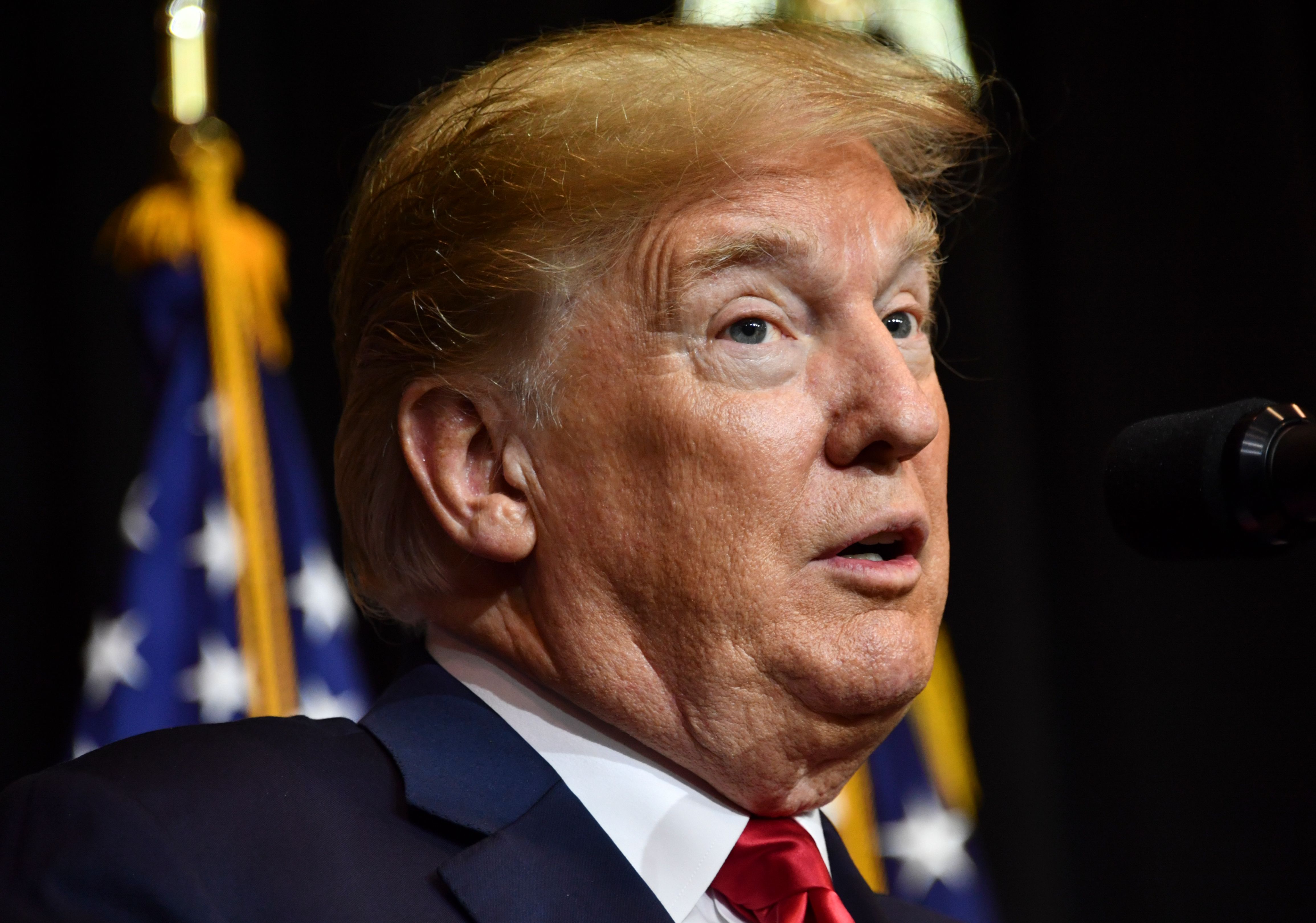 Donald Trump speaks during a fundraiser in Sioux Falls, South Dakota on Sept. 7, 2018. (NICHOLAS KAMM/AFP/Getty Images)