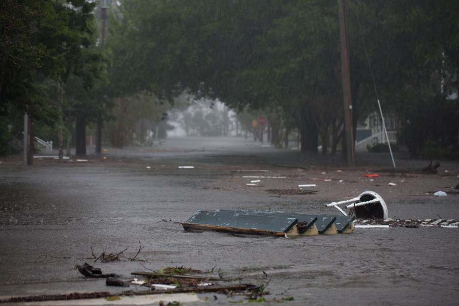 Flood waters rise up from the Neuse River in New Bern, North Carolina, September 14, 2018 during Hurricane Florence. (Credit: LOGAN CYRUS/AFP/Getty Images)