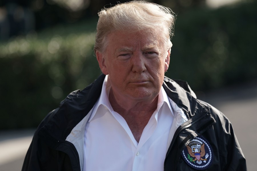 Donald Trump speaks to members of the media prior to a Marine One departure at the South Lawn of the White House on Sept. 19, 2018. (Credit: Alex Wong/Getty Images)