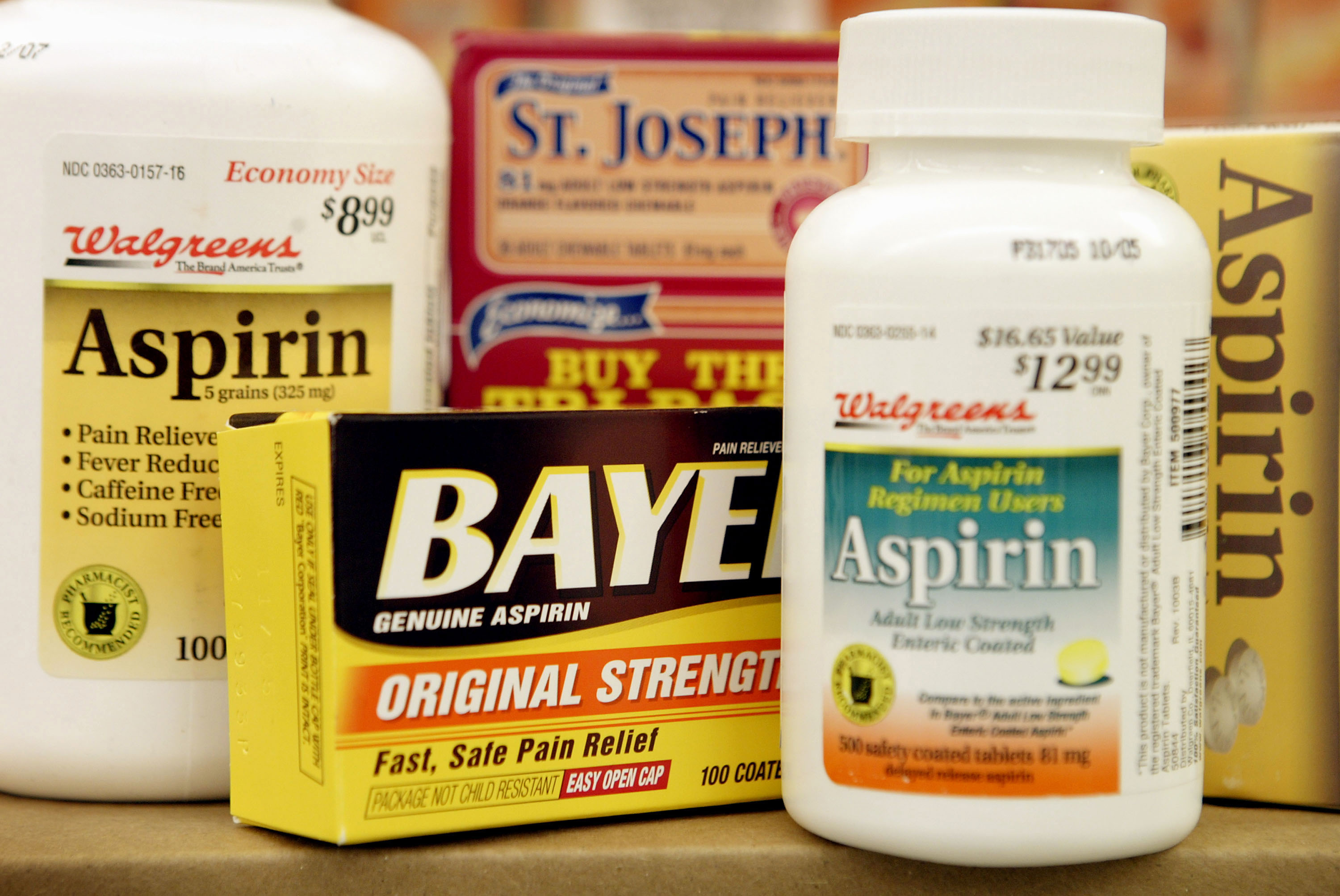 Aspirin products sit on the shelf at a Walgreens drug store in this file photo. (Credit: Scott Olson/Getty Images)