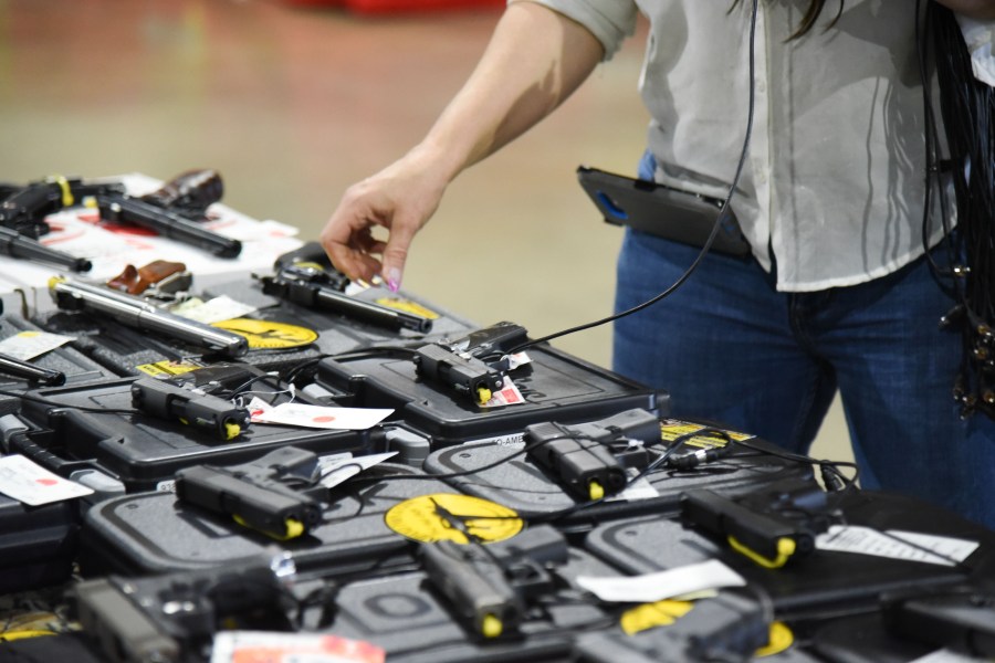 Preparations are underway February 16, 2018, for the February 17-18 South Florida Gun Show at Dade County Youth Fairgrounds in Miami. (Credit: MICHELE EVE SANDBERG/AFP/Getty Images)