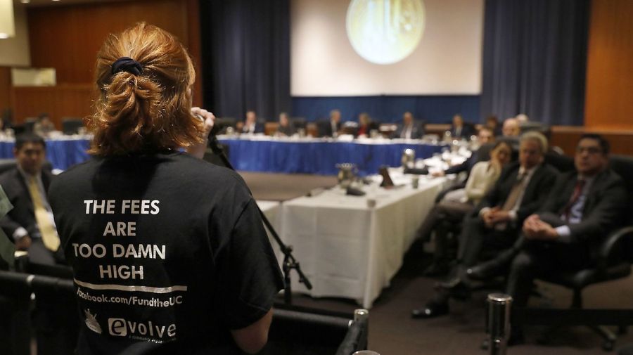 UC Berkeley student Kylie Murdock addresses the UC Board of Regents as she speaks out against tuition hikes at a meeting in 2018. (Credit: Mel Melcon / Los Angeles Times)