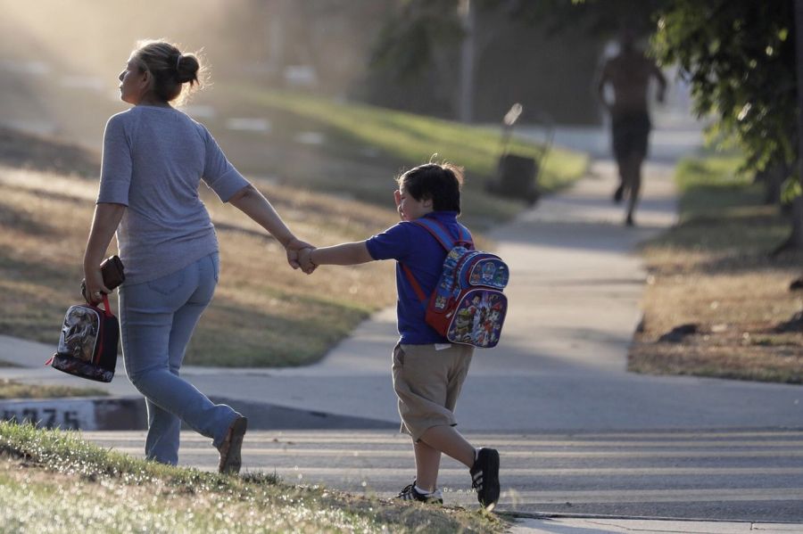 Students arrive at Baldwin Hills Elementary School on Aug. 14, 2018, for the first day of class for the Los Angeles Unified School District, the nation's second-largest school system. (Irfan Khan / Los Angeles Times)