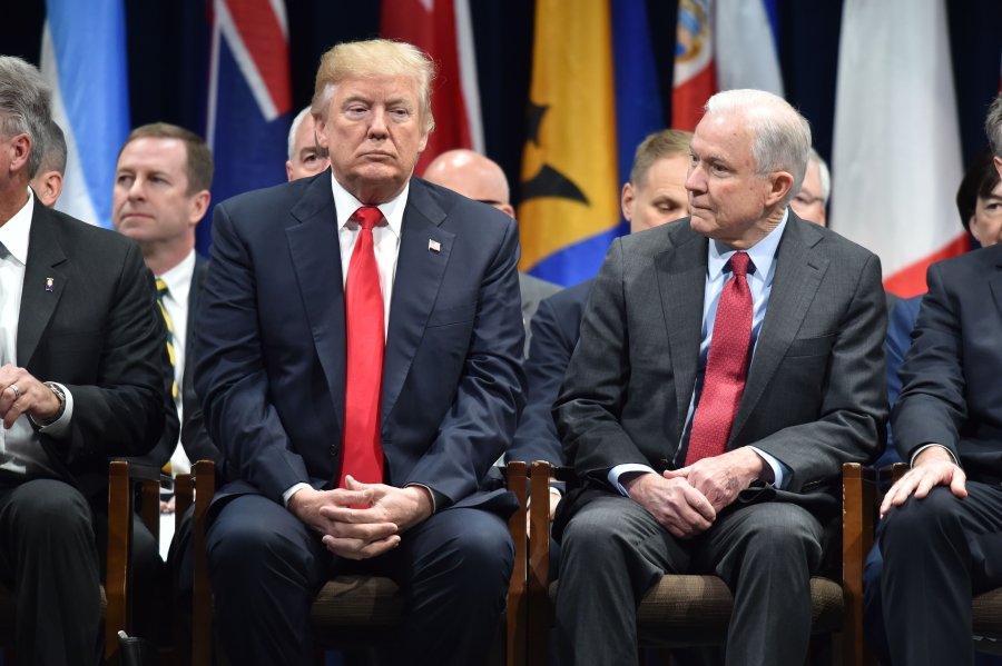 President Donald Trump lamented the indictments of two Republican lawmakers who were his earliest supporters in Congress during the 2016 election and suggested they were politically motivated, in tweets he posted on Sept. 3, 2018. He and Attorney General Jeff Sessions, who he blasted in the tweets, are seen in this undated image. (Credit: AFP/Getty Images via CNN)