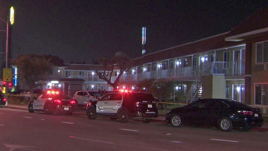 Police investigate a shooting at a Super 8 motel in Azusa on Sept. 6, 2018. (Credit: KTLA)