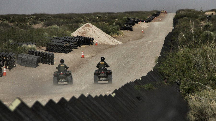 In this file photo, U.S. Border Patrol agents ride their ATV's along a stretch of the U.S.-Mexico border on April 17, 2018. (Credit: HERIKA MARTINEZ/AFP/Getty Images)