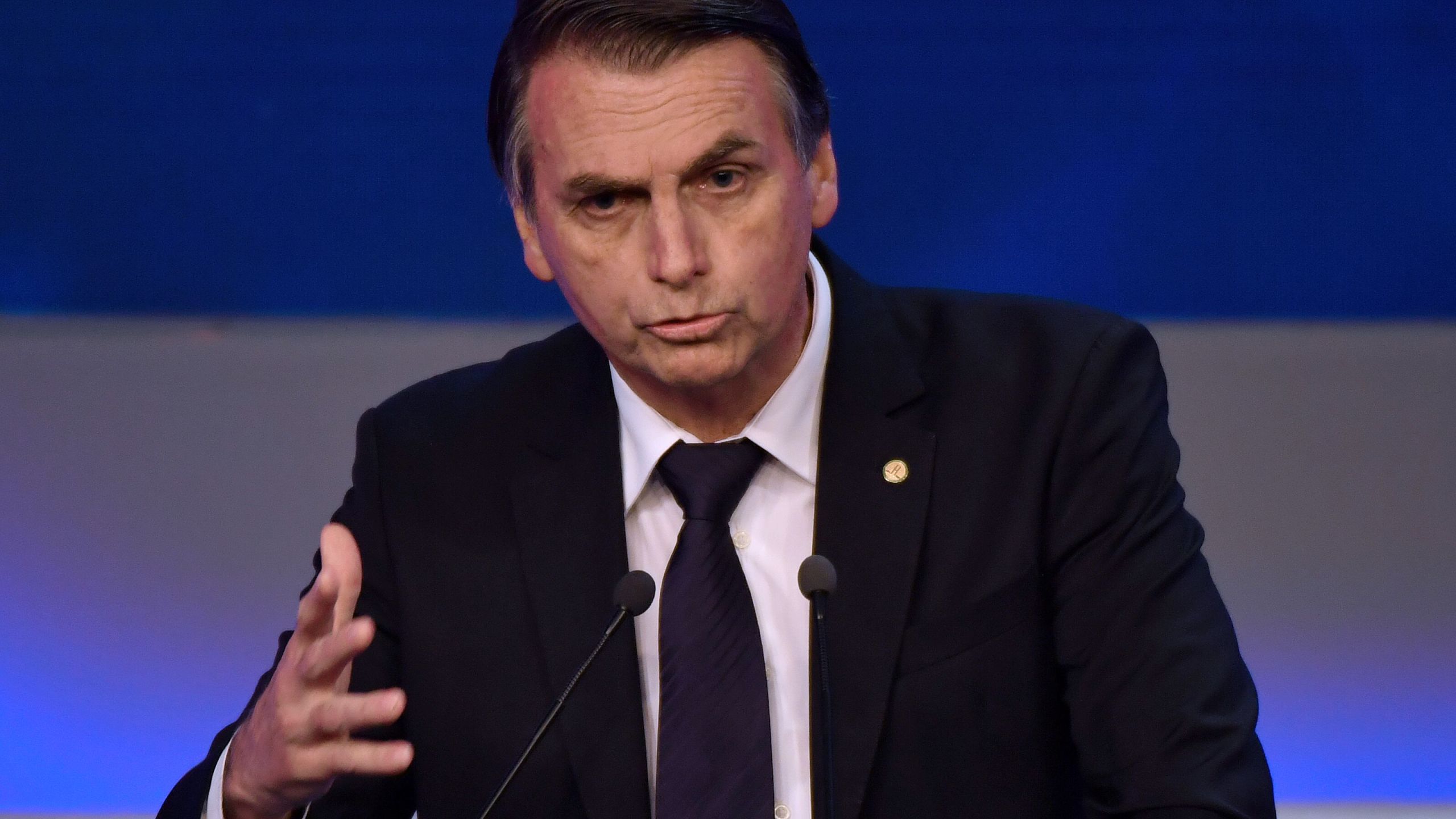 Brazilian presidential candidate Jair Bolsonaro speaks during the first presidential debate ahead of the Oct. 7 general election, at Bandeirantes television network in Sao Paulo, Brazil, on Aug. 9, 2018. (Credit: Nelson Almeida/ AFP/Getty Images)