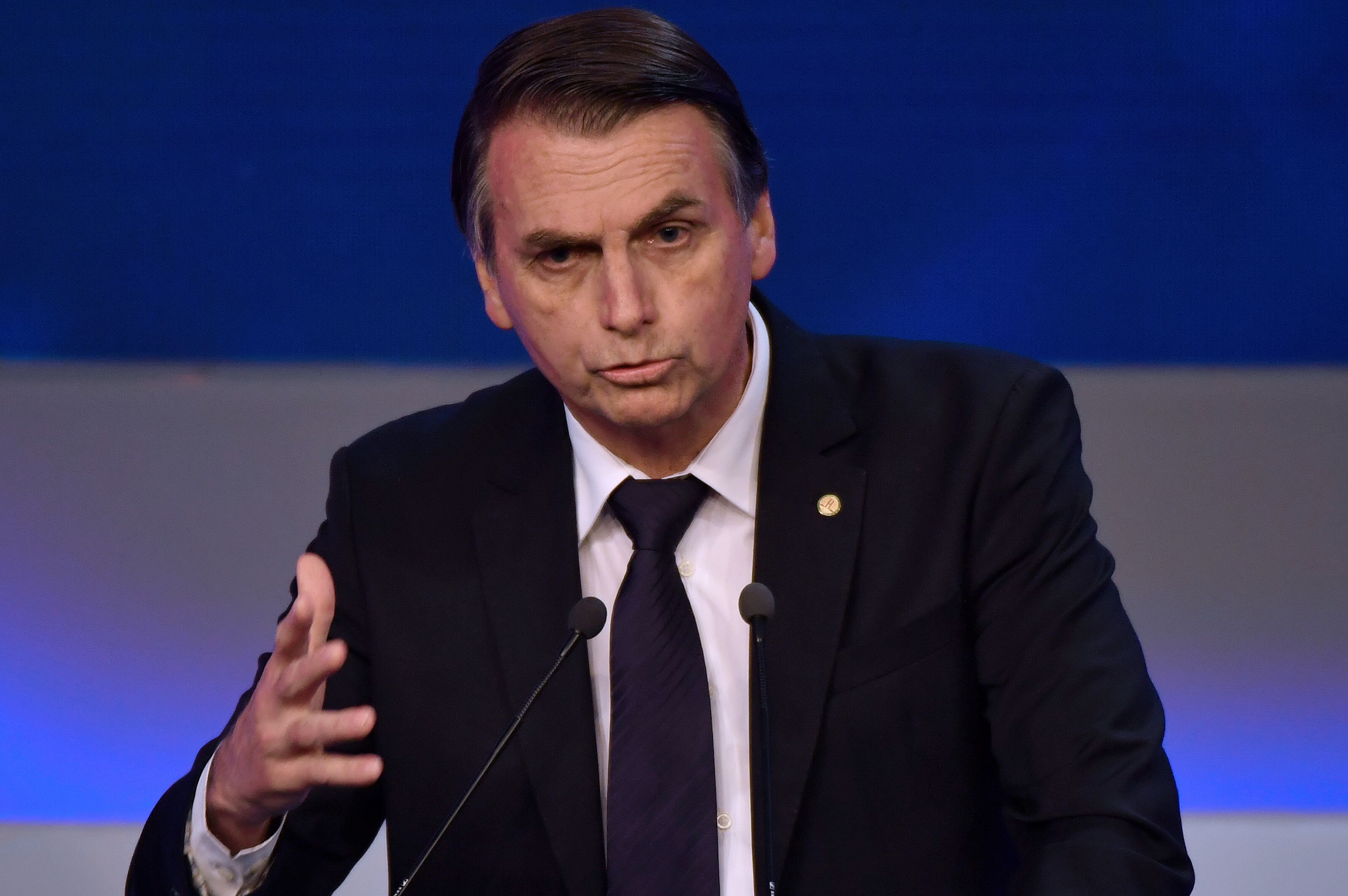 Brazilian presidential candidate Jair Bolsonaro speaks during the first presidential debate ahead of the Oct. 7 general election, at Bandeirantes television network in Sao Paulo, Brazil, on Aug. 9, 2018. (Credit: Nelson Almeida/ AFP/Getty Images)