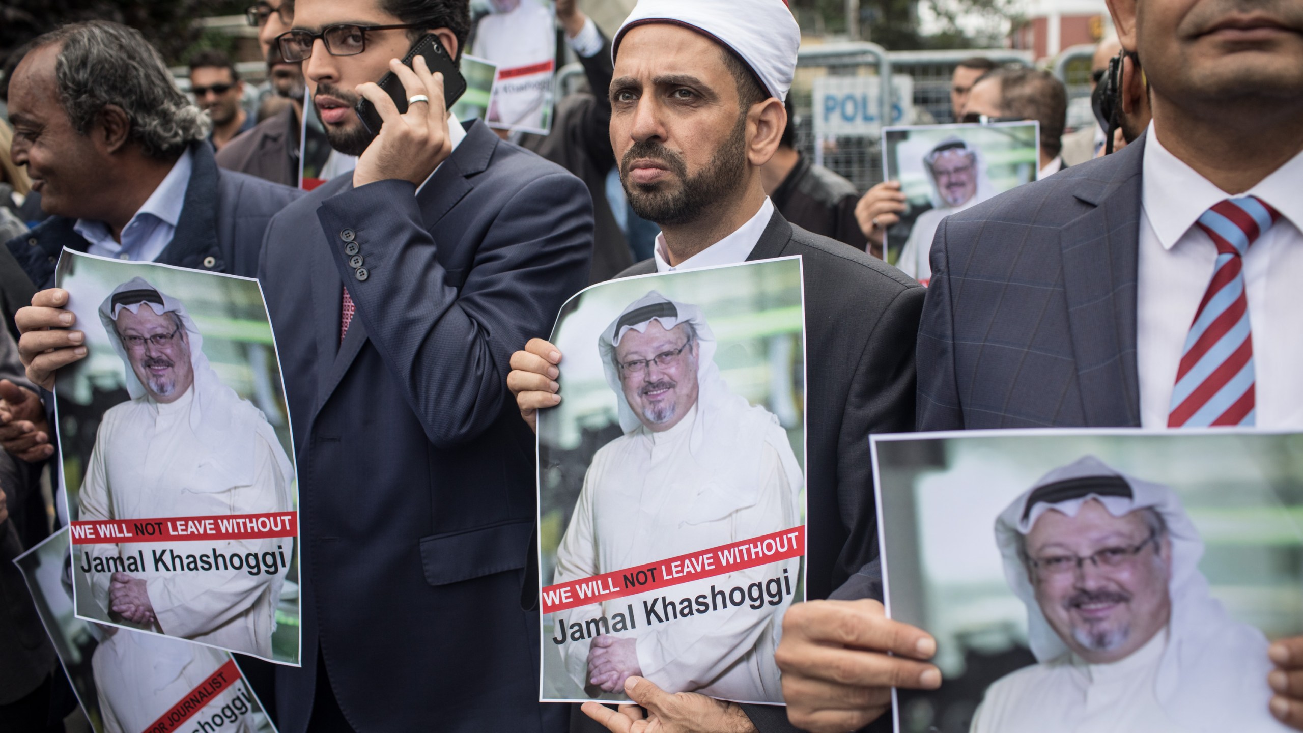 People hold posters of missing Saudi journalist Jamal Khashoggi during a protest organized by members of the Turkish-Arabic Media Association at the entrance to Saudi Arabia's consulate on Oct. 8, 2018 in Istanbul. (Credit: Chris McGrath/Getty Images)