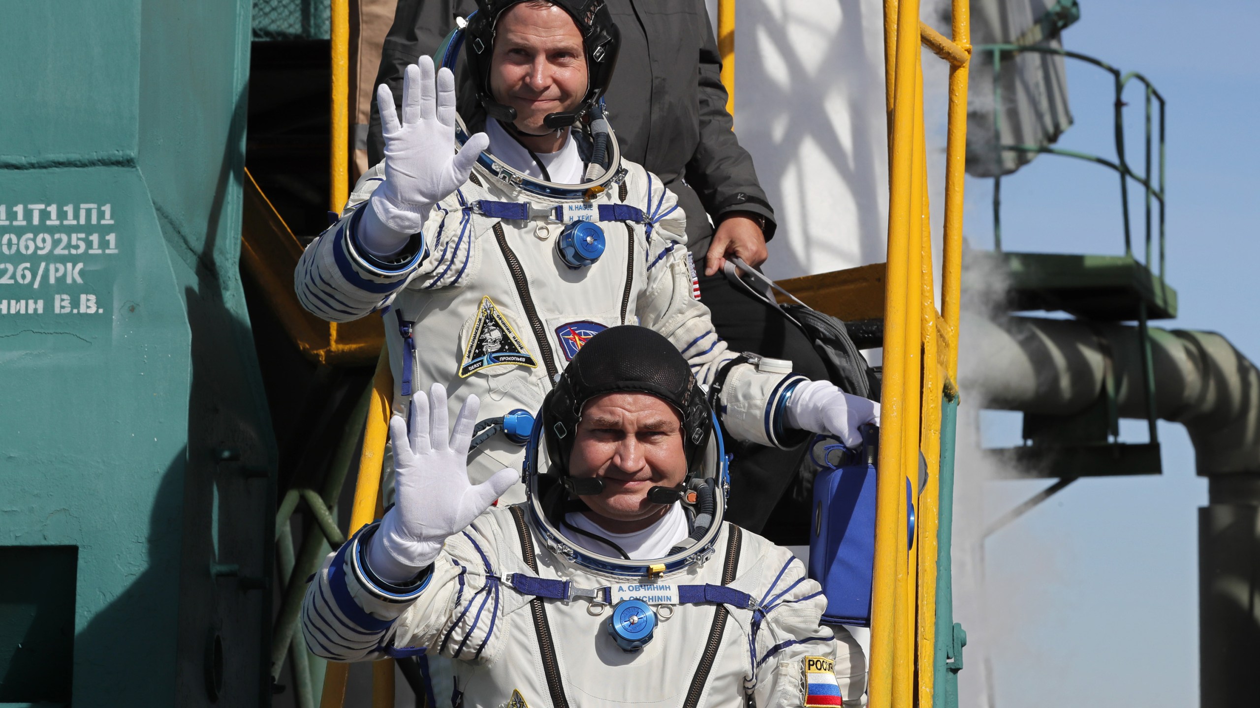 Members of the International Space Station (ISS) expedition 57/58, NASA astronaut Nick Hague and Roscosmos cosmonaut Alexey Ovchinin board the Soyuz MS-10 spacecraft prior to the launch at the Russian-leased Baikonur cosmodrome in Kazakhstan on October 11, 2018. (Credit: YURI KOCHETKOV/AFP/Getty Images)