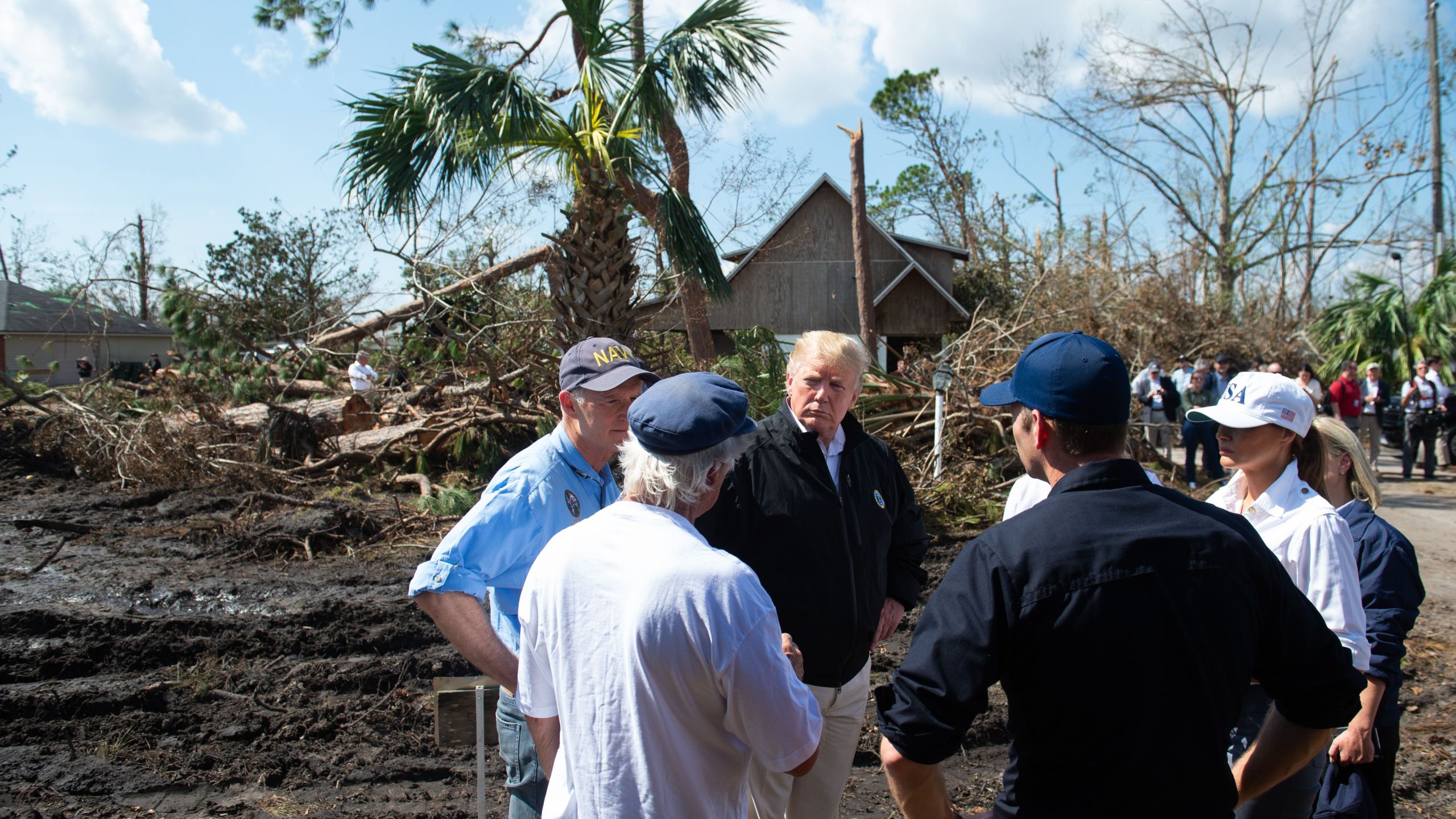 President Donald Trump and first lady Melania Trump tour damage from Hurricane Michael in Lynn Haven, Florida, October 15, 2018. (Credit: SAUL LOEB/AFP/Getty Images)