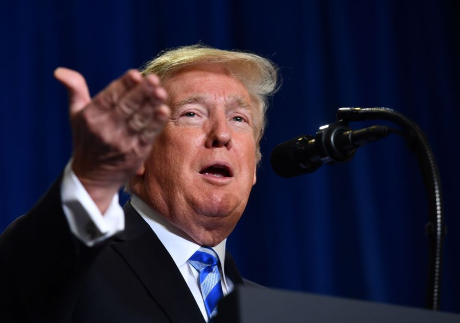 US President Donald Trump speaks at the Department of Health and Human Services in Washington, DC, on October 25, 2018. (Credit: NICHOLAS KAMM/AFP/Getty Images)