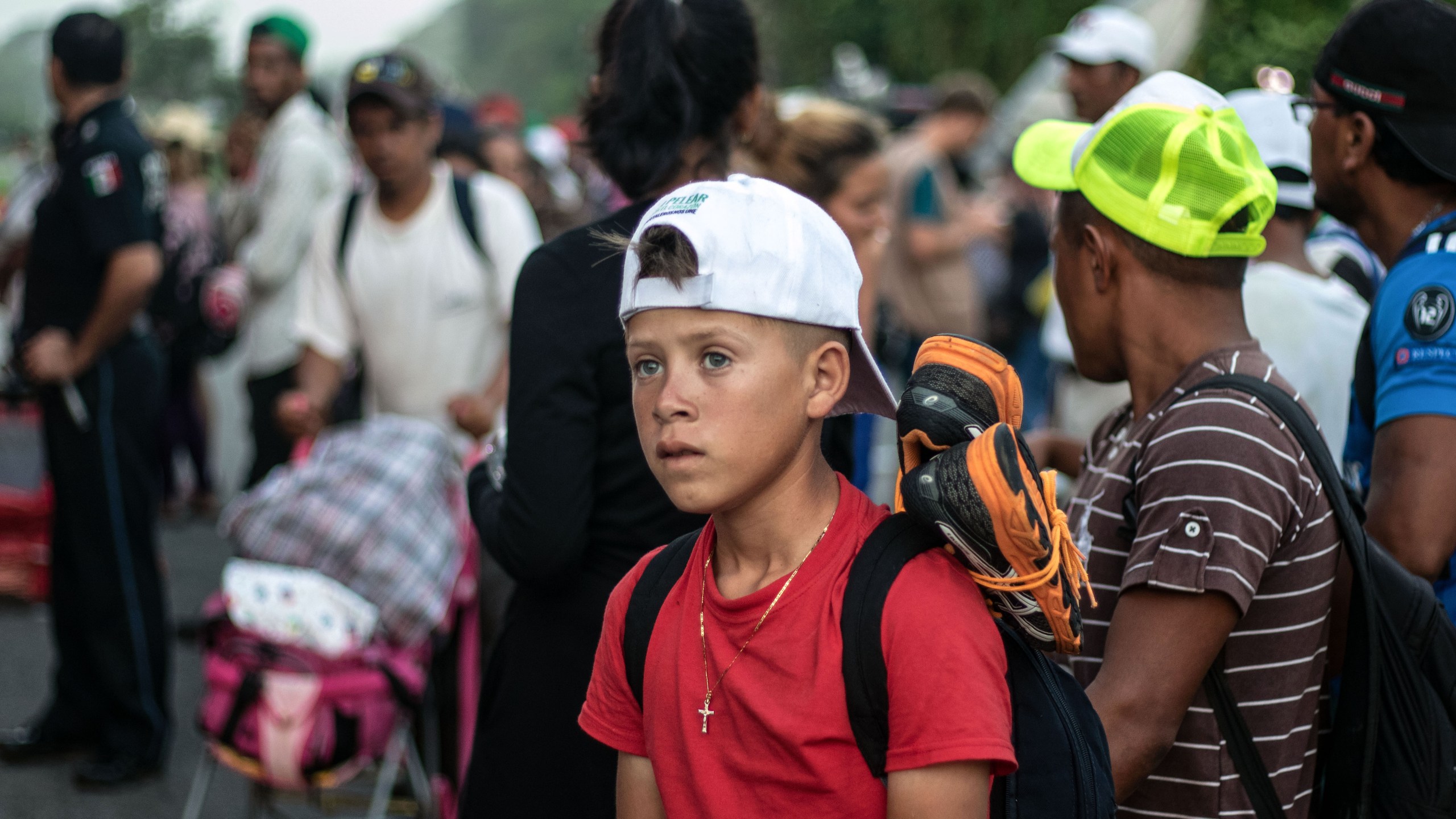 Honduran migrants heading in a caravan to the U.S., await at the roadside to get a ride, near Pijijiapan, southern Mexico on Oct. 26, 2018. (Credit: GUILLERMO ARIAS/AFP/Getty Images)