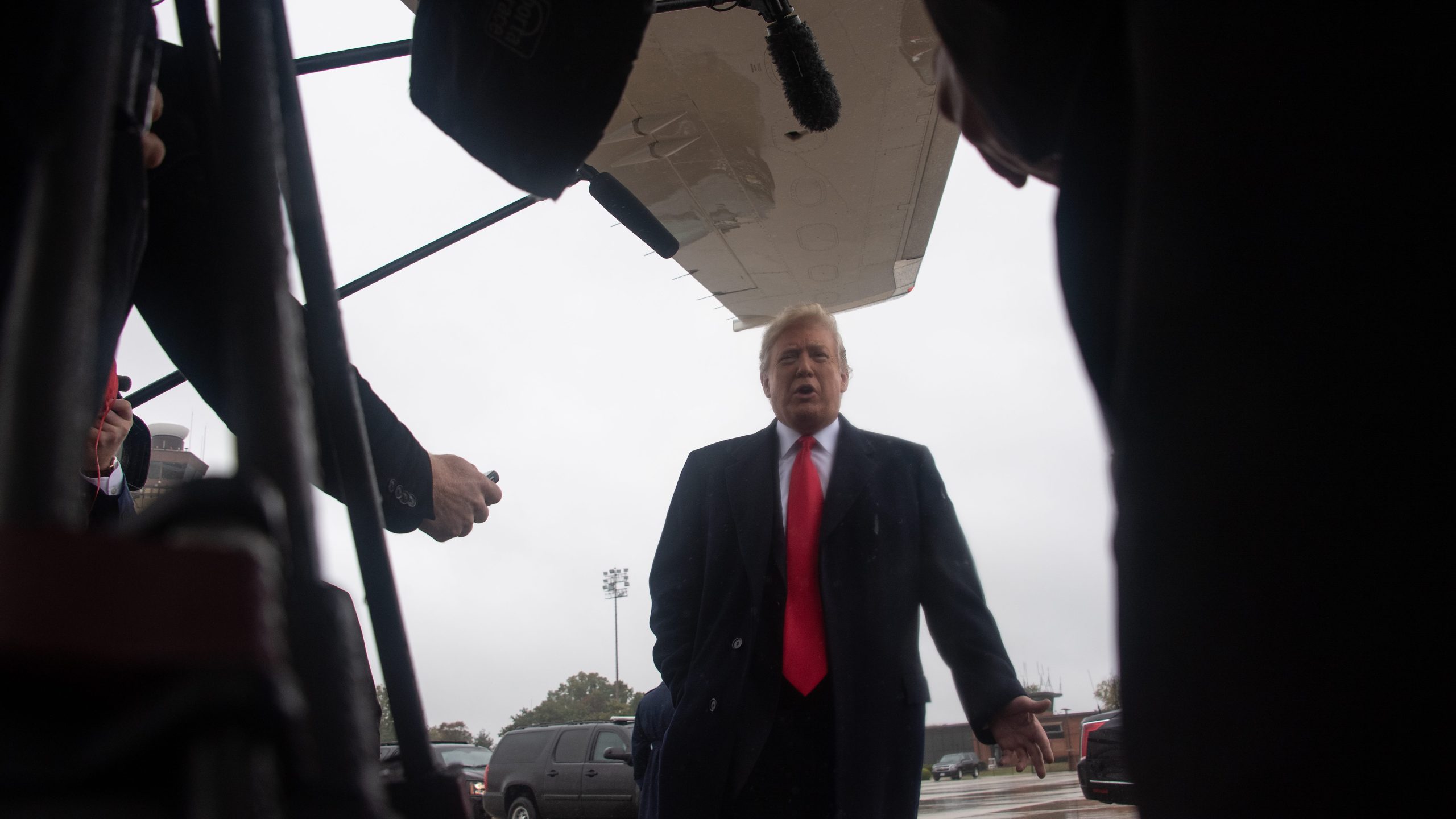 Donald Trump speaks to the press before boarding Air Force One at Andrews Air Force Base in Maryland on Oct. 27, 2018. (Credit: NICHOLAS KAMM/AFP/Getty Images)