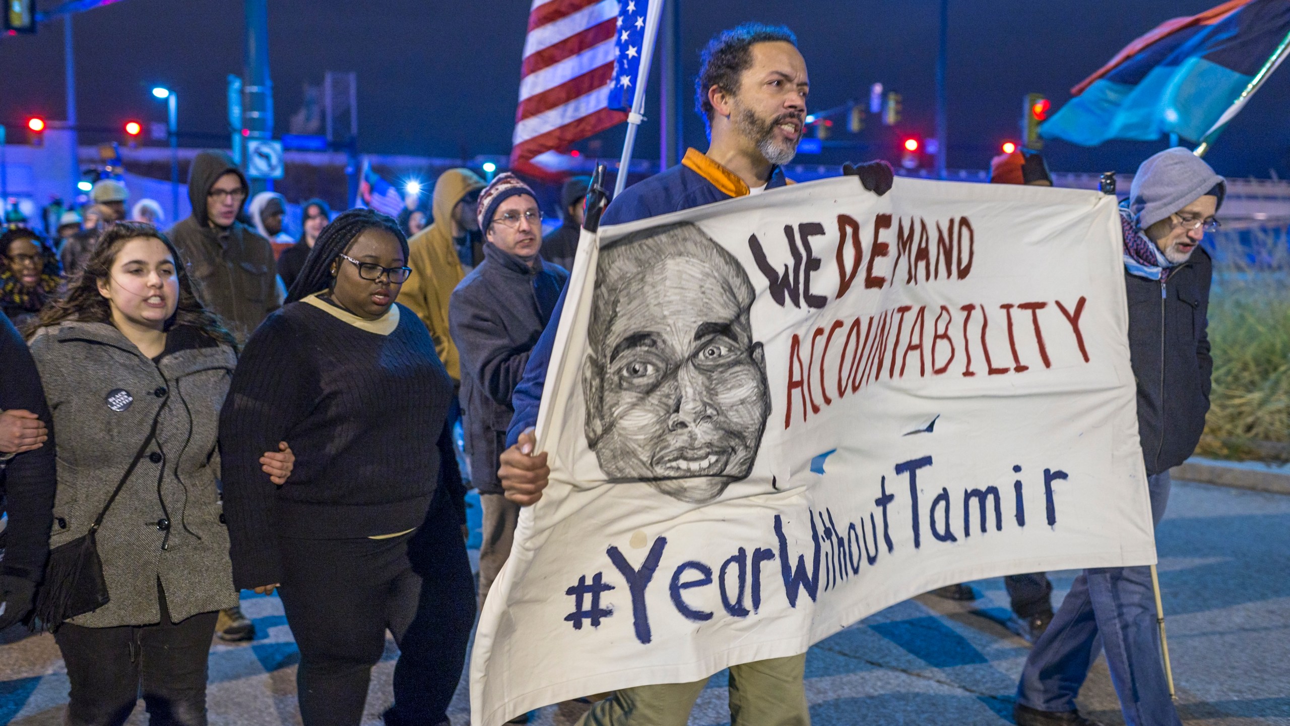 Demonstrators march on Ontario St. on Dec. 29, 2015 in Cleveland, Ohio. (Credit: Angelo Merendino/Getty Images)