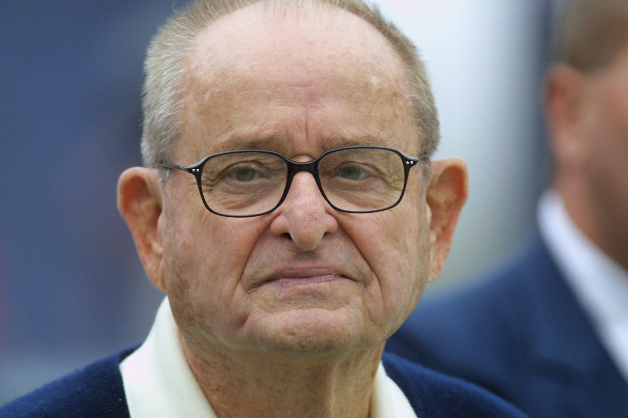 Chargers owner Alex Spanos watches his team warm up for their game with the Buffalo Bills at Qualcomm Stadium in San Diego on Oct. 28, 2001. (Credit: Stephen Dunn/Allsport)