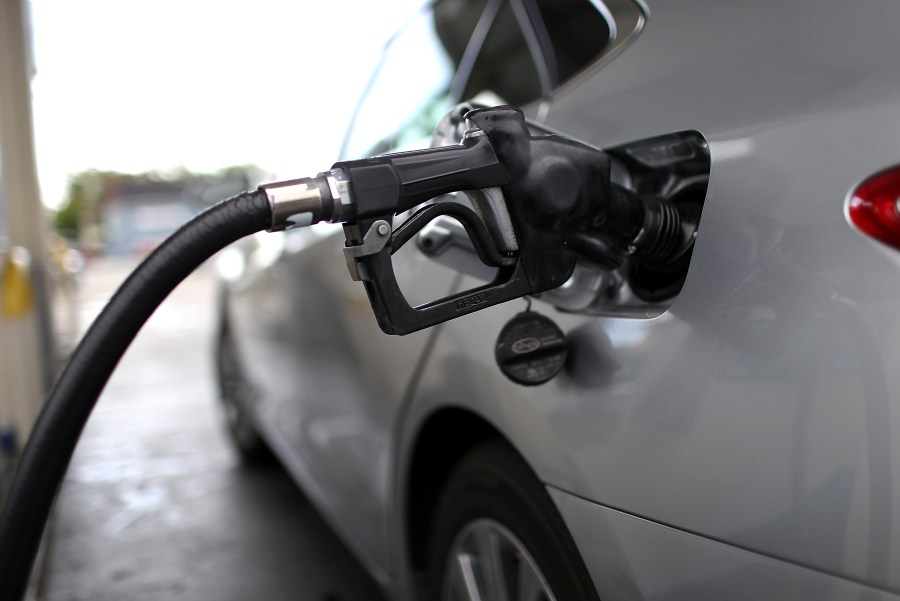 A gas pump fills a car with fuel at a gas station on May 10, 2017 in San Rafael. (Credit: Justin Sullivan/Getty Images)