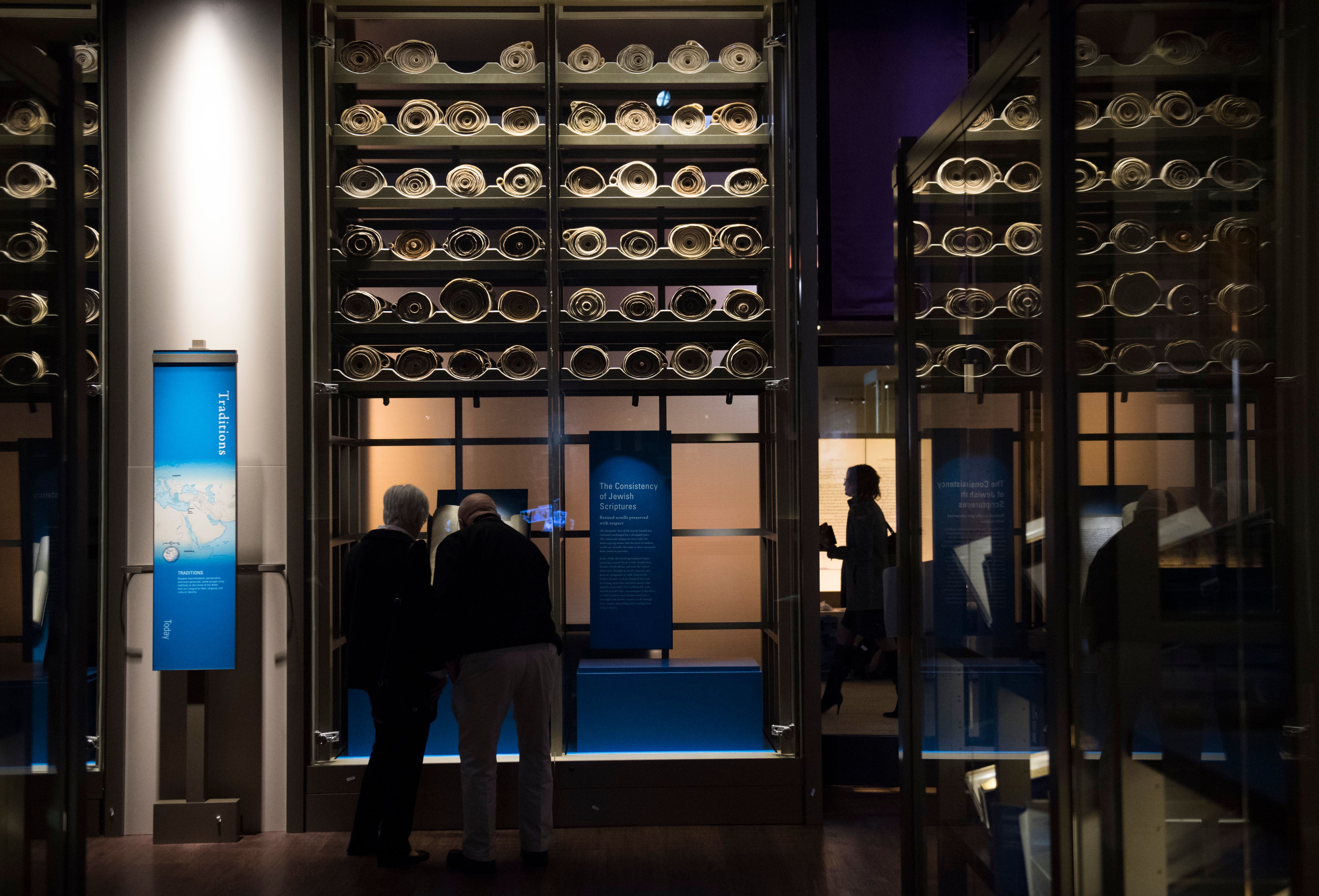 Visitors tour the "History of the Bible" exhibit during a media preview of the new Museum of the Bible in Washington, D.C., Nov. 14, 2017. (Credit: Saul Loeb / AFP / Getty Images)