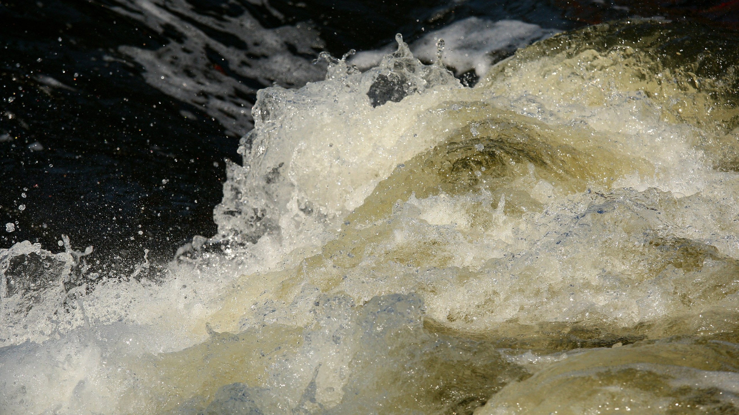 Fast-moving water is shown in this file photo from May 30, 2009. (Credit: Richard Heathcote/Getty Images)