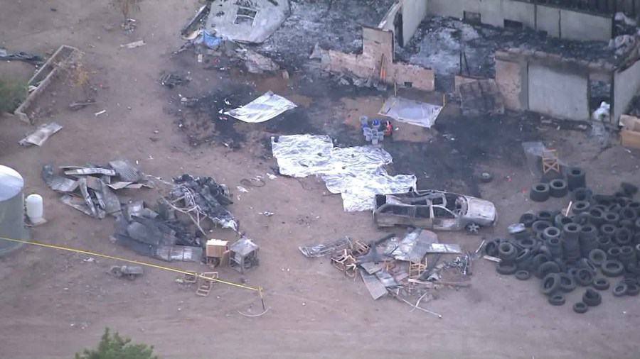 Detectives investigate the discovery of human remains in the 30900 block of 106th Street, near Littlerock, on Oct. 11, 2018. (Credit: KTLA)