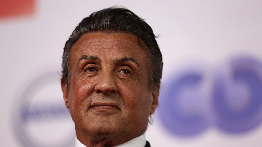 American actor and director Sylvester Stallone poses for photographers on the red carpet at the El Gouna film festival on the Red Sea in Egypt on Sept. 28, 2018. (Credit: PATRICK BAZ / EL GOUNA FILM FESTIVAL/ AFP/Getty Images)