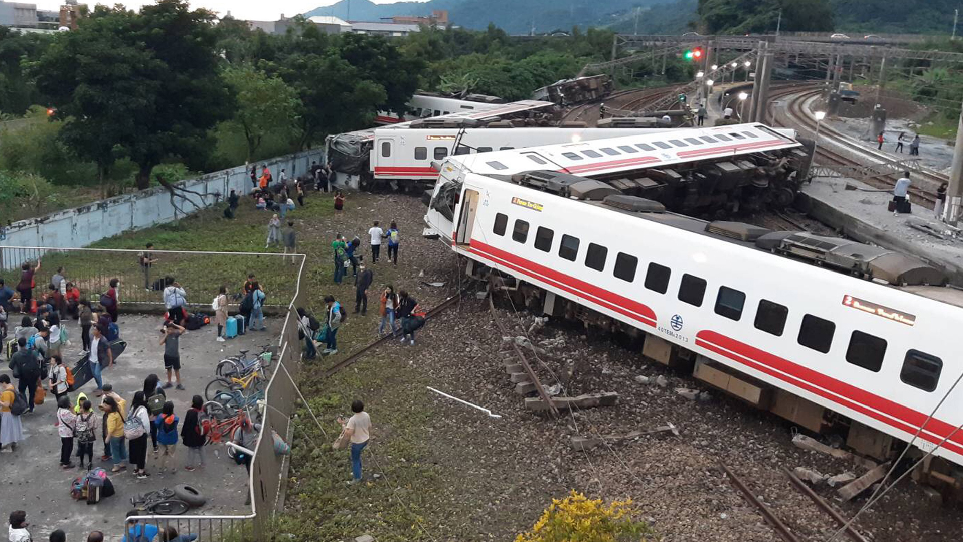 This CNA handout picture taken on Oct. 21, 2018, shows a derailed train in Yian, eastern Taiwan. (Credit: CNA/AFP/Getty Images)