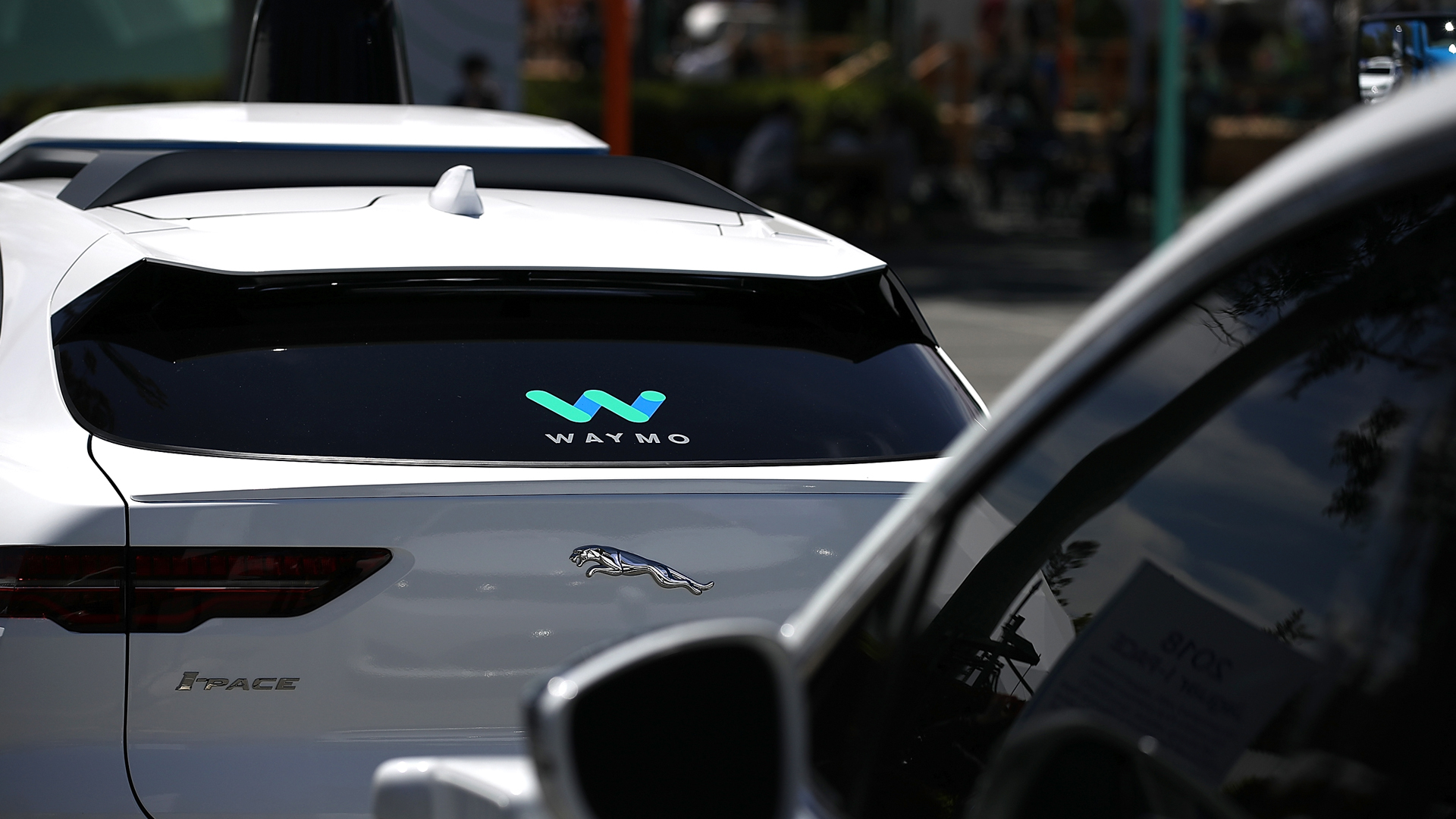 Waymo self-driving vehicles are displayed at the Google I/O 2018 Conference at Shoreline Amphitheater on May 8, 2018, in Mountain View, Calif. (Credit: Justin Sullivan/Getty Images)