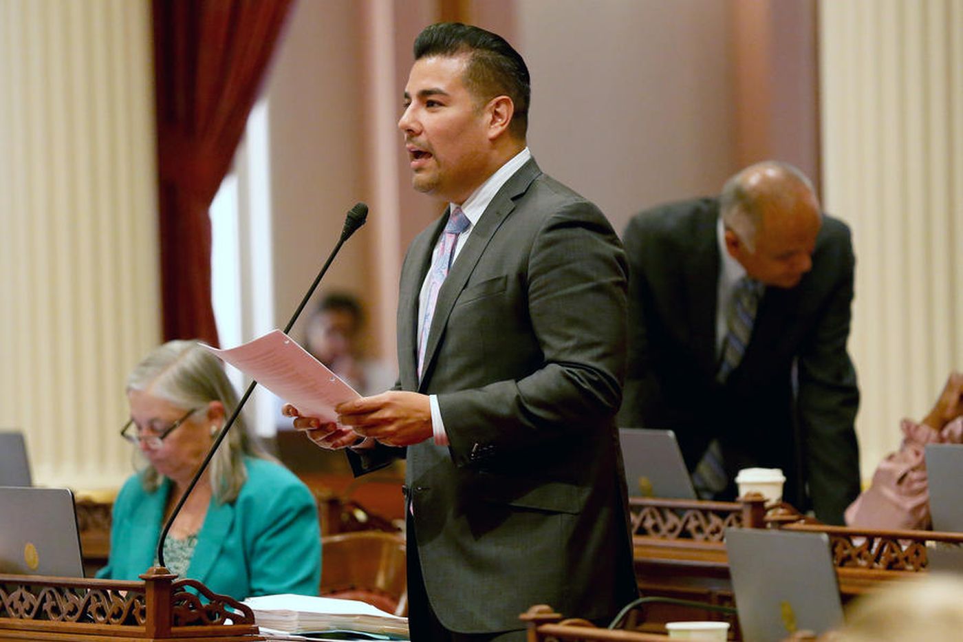 State Sen. Ricardo Lara presents a bill on the Senate floor in this undated photo. (Credit: Gary Coronado / Los Angeles Times)