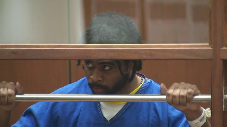 Gene Atkins, 28, appears in Los Angeles County Superior Court on Nov. 7, 2018, where he was expected to be arraigned on murder and other charges in connection with a shootout with police outside a Trader Joe's store that left one woman dead in July 2018. (Credit: KTLA)