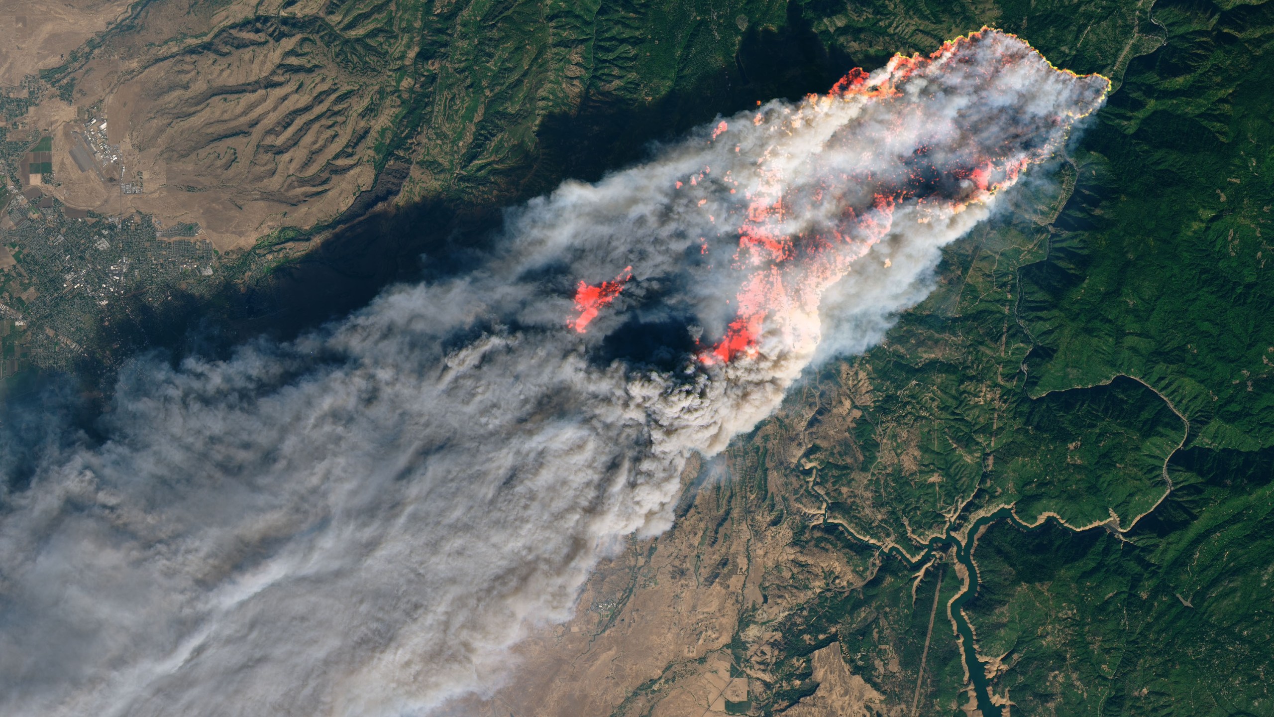 An image released by NASA on Nov. 9, 2018, shows the devastating and deadly Camp Fire in Northern California, as seen from space.