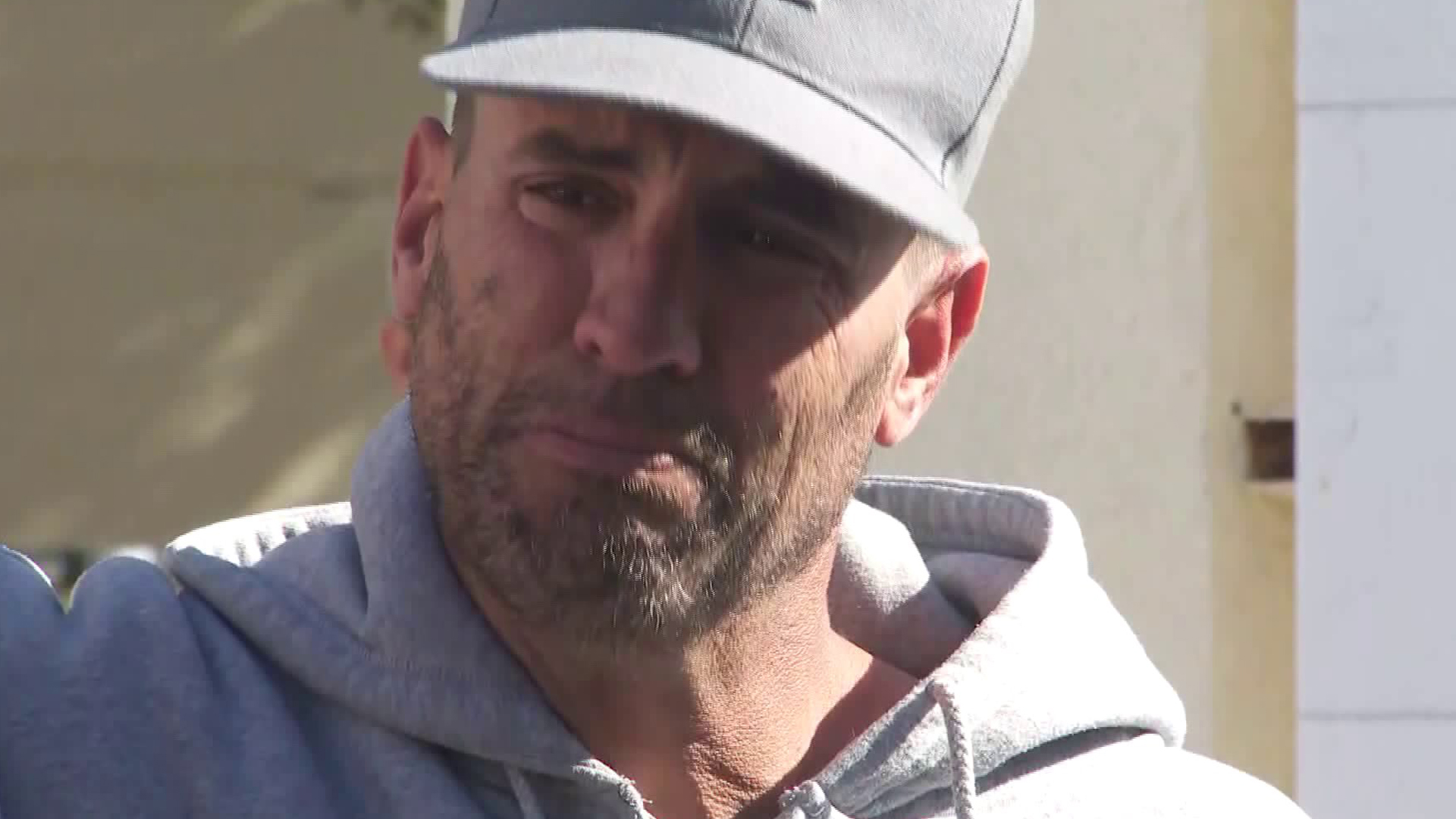 Jason Coffman tearfully speaks with reporters in Thousand Oaks after learning of the death of his son, Cody, on Nov. 7, 2018. (Credit: KTLA)