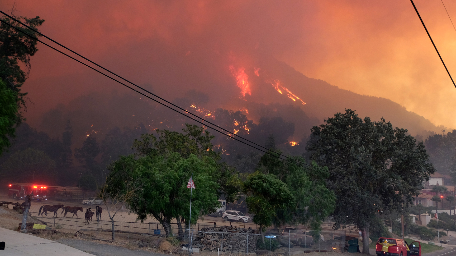 Firefighters work to protect structures as the Woolsey Fire burns near Paramount Ranch on November 9, 2018 in Agoura Hills. (Credit: Matthew Simmons/Getty Images)