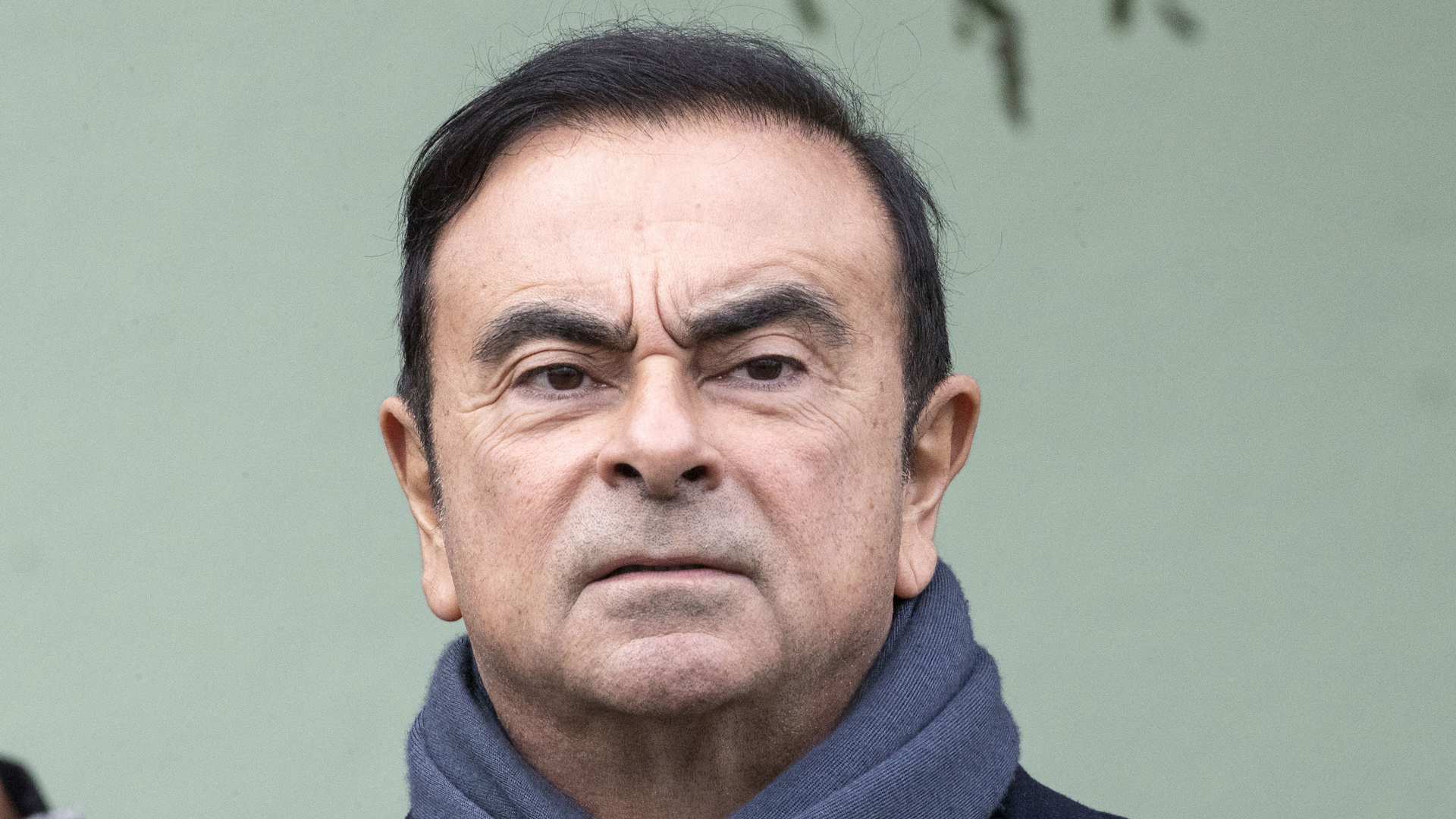 Nissan chairman Carlos Ghosn waits for the French President Emmanuel Macron to arrive for a visit of the Renault factory in Maubeuge northeastern France on Nov. 8, 2018. (Credit: Etienne Laurent/AFP/Getty Images)