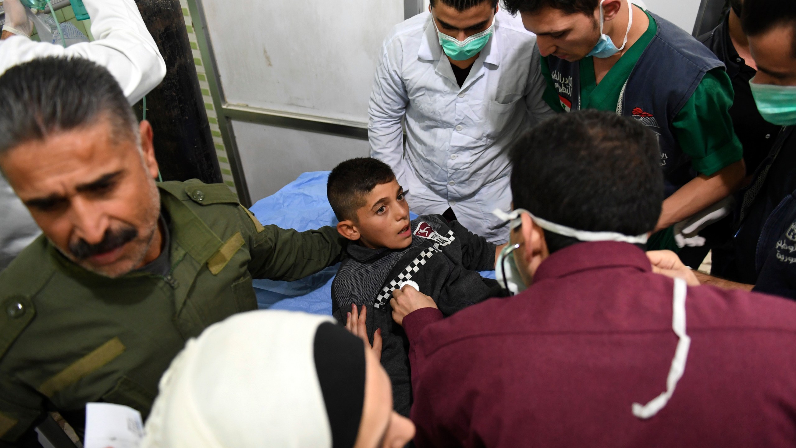 A Syrian boy receives treatment at a hospital in the regime controlled Aleppo on November 24, 2018. - Official Syrian media accused the armed opposition of launching an attack with 'toxic gas' on the northern city, but a leading rebel alliance has denied any involvement. (Credit: George Ourfalian/AFP/Getty Images)