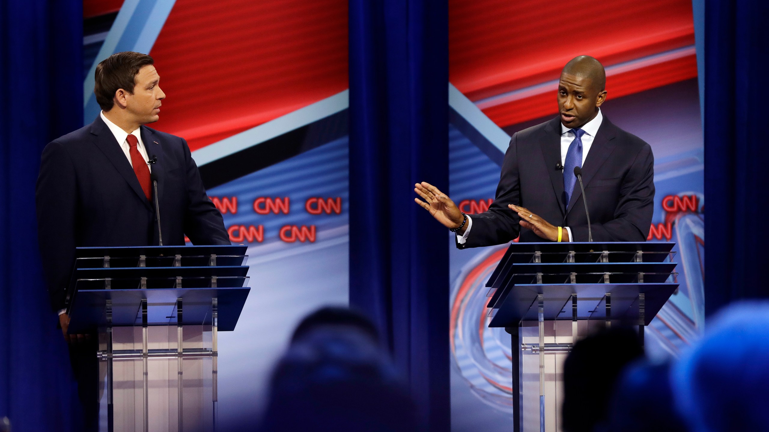 Florida Democratic gubernatorial candidate Andrew Gillum, right, addresses his Florida Republican opponent Ron DeSantis during a CNN debate on Oct. 21, 2018, in Tampa, Florida. (Credit: Chris O'Meara-Pool/Getty Images)