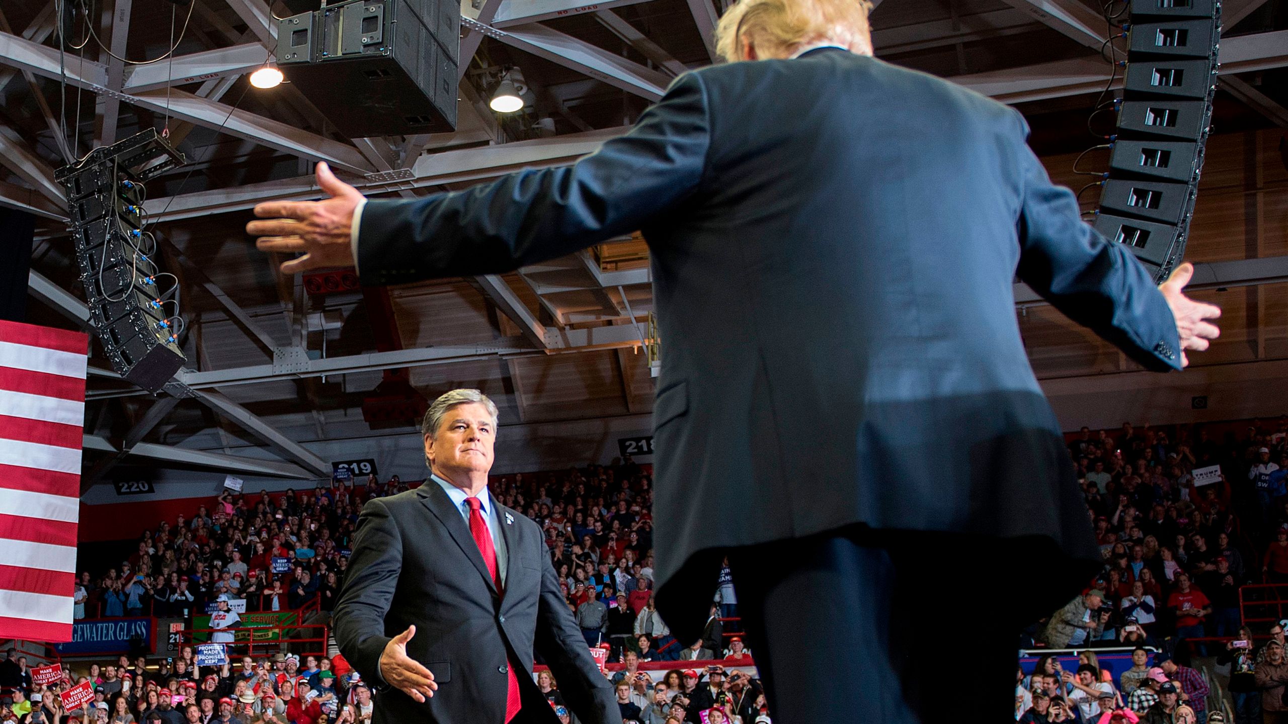 Donald Trump greets talk show host Sean Hannity at a Make America Great Again rally in Cape Girardeau, Missouri on Nov. 5, 2018. (Credit: by Jim Watson/AFP/Getty Images)