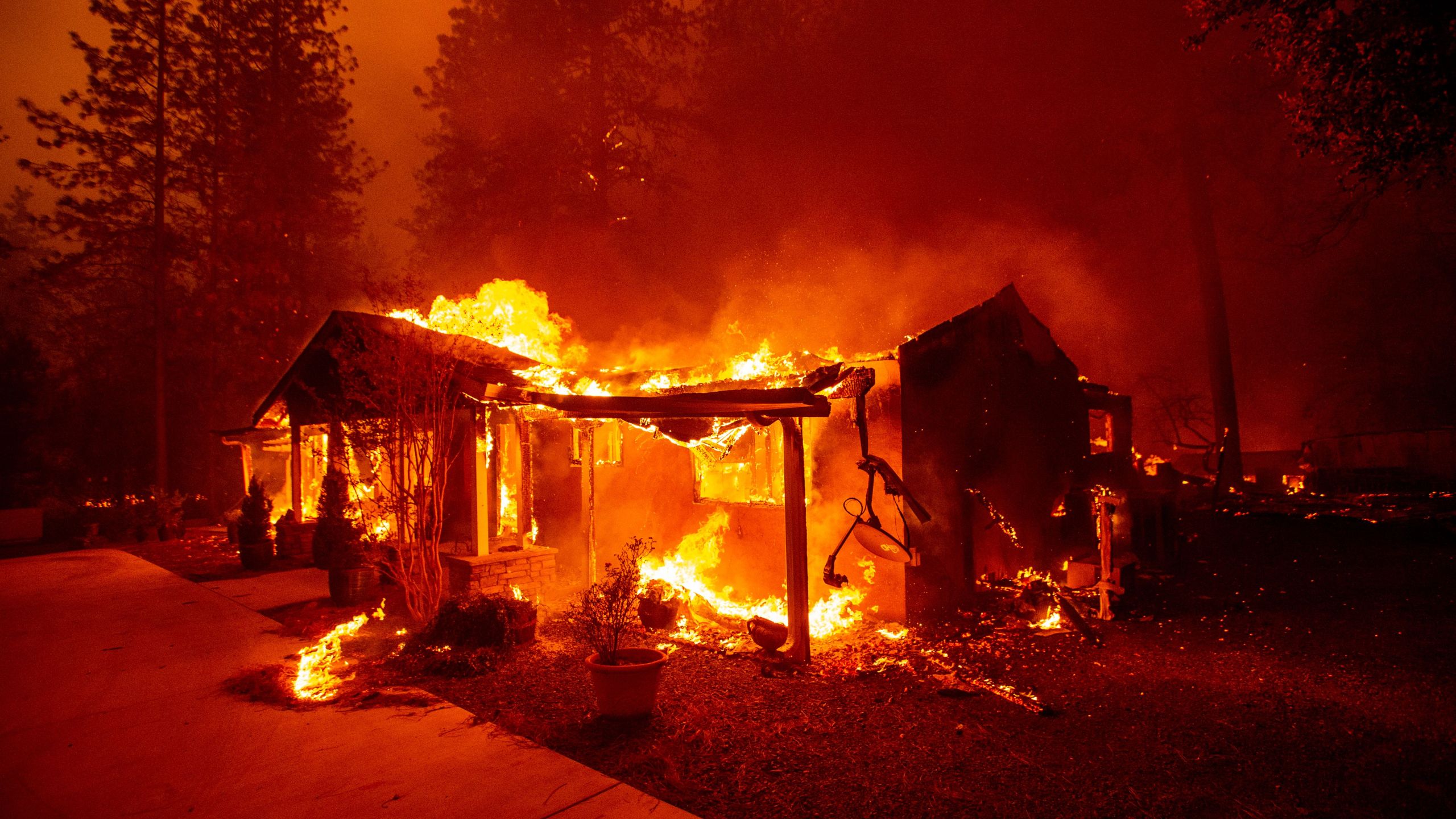 A home burns during the Camp fire in Paradise in Northern California on Nov. 8, 2018. (Credit: JOSH EDELSON/AFP/Getty Images)