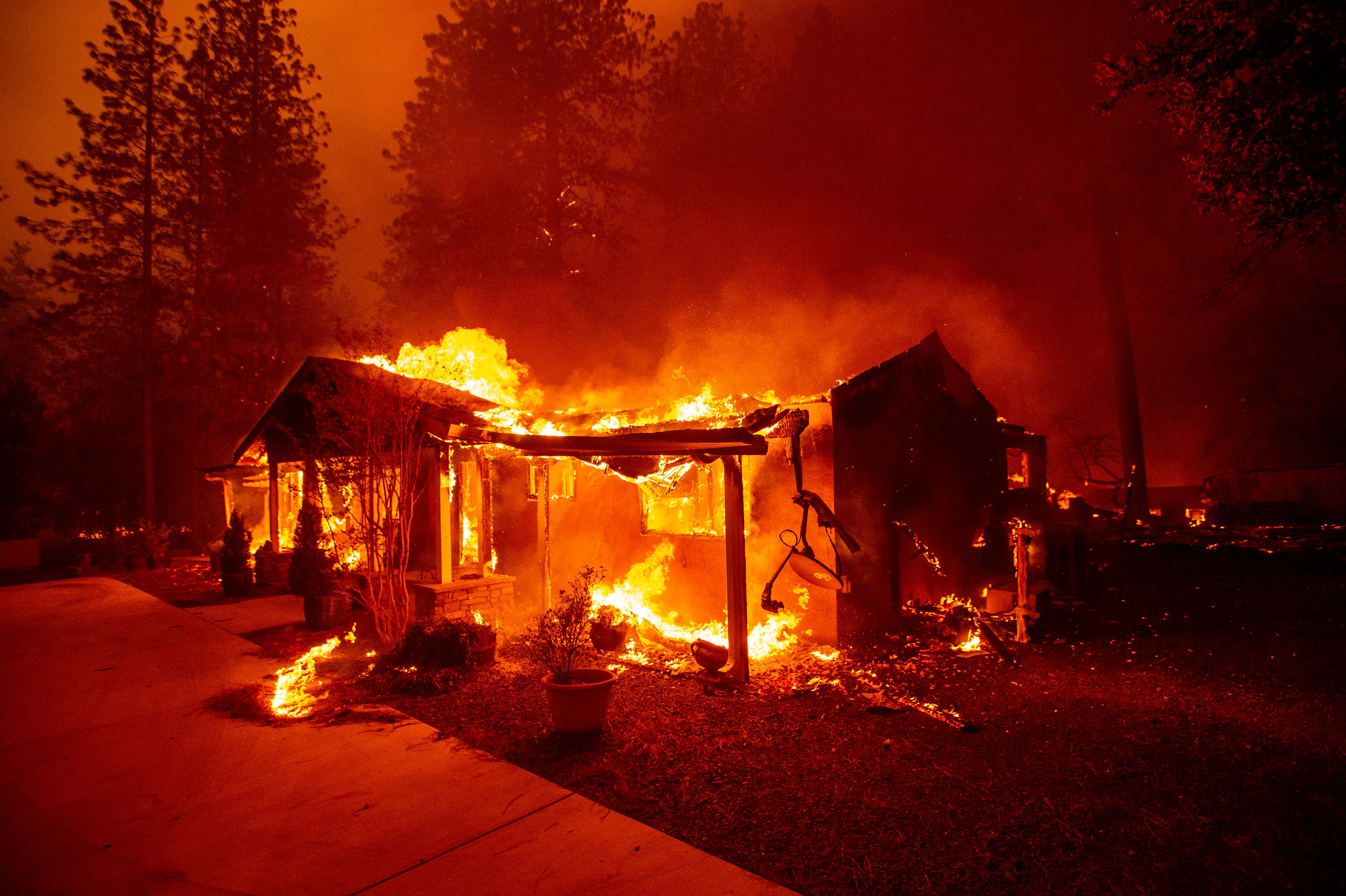 A home burns during the Camp fire in Paradise in Northern California on Nov. 8, 2018. (Credit: JOSH EDELSON/AFP/Getty Images)