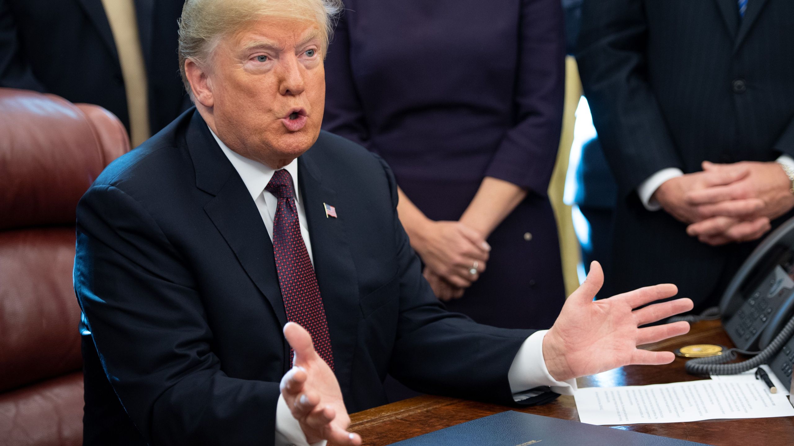 President Donald Trump speaks after signing the Cybersecurity and Infrastructure Security Agency Act in the Oval Office of the White House on Nov. 16, 2018. (Credit: Saul Loeb / AFP / Getty Images)