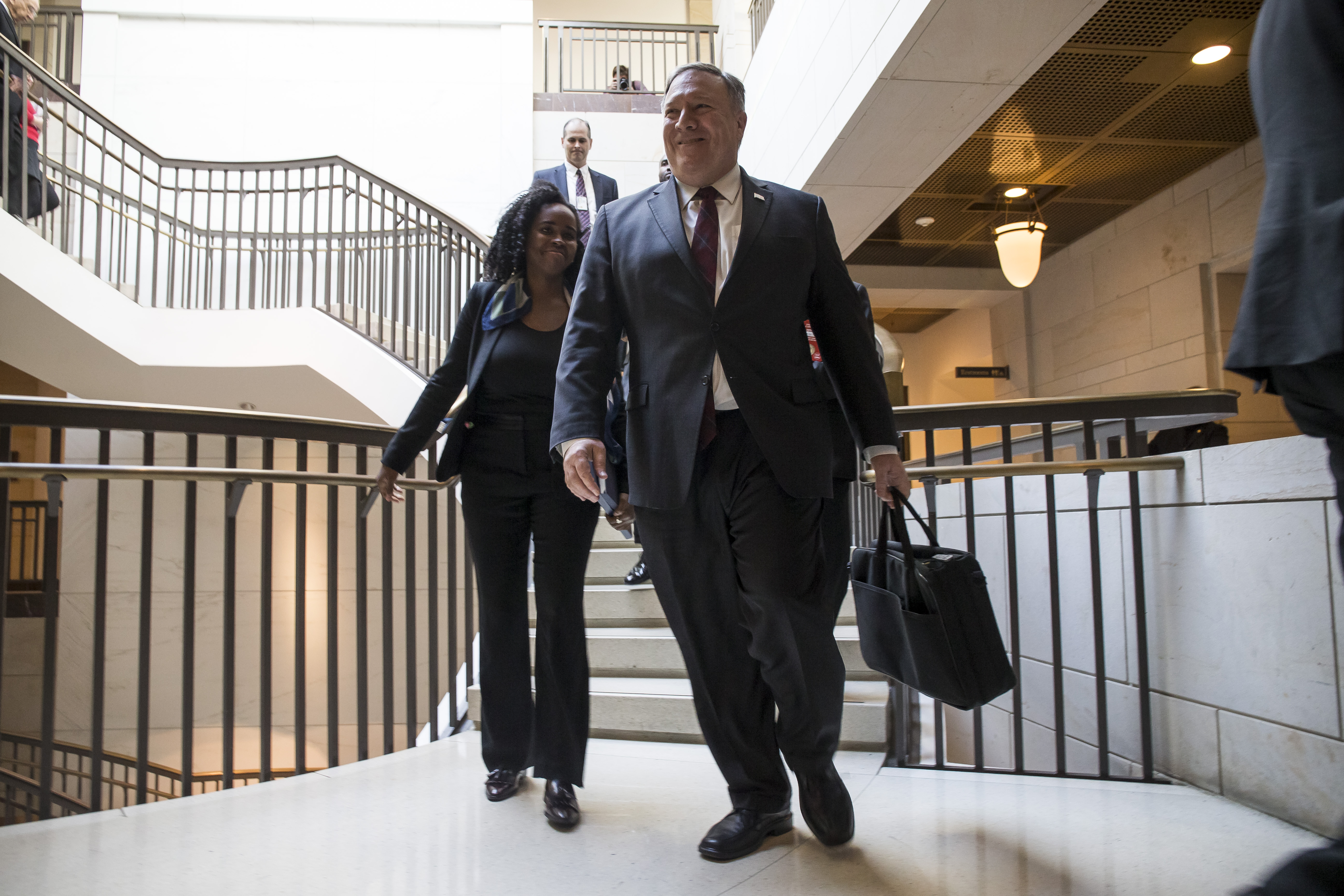 U.S. Secretary of State Mike Pompeo walks to a briefing with members of the Senate to discuss developments in Saudi Arabia on Nov. 28, 2018. (Credit: Zach Gibson/Getty Images)