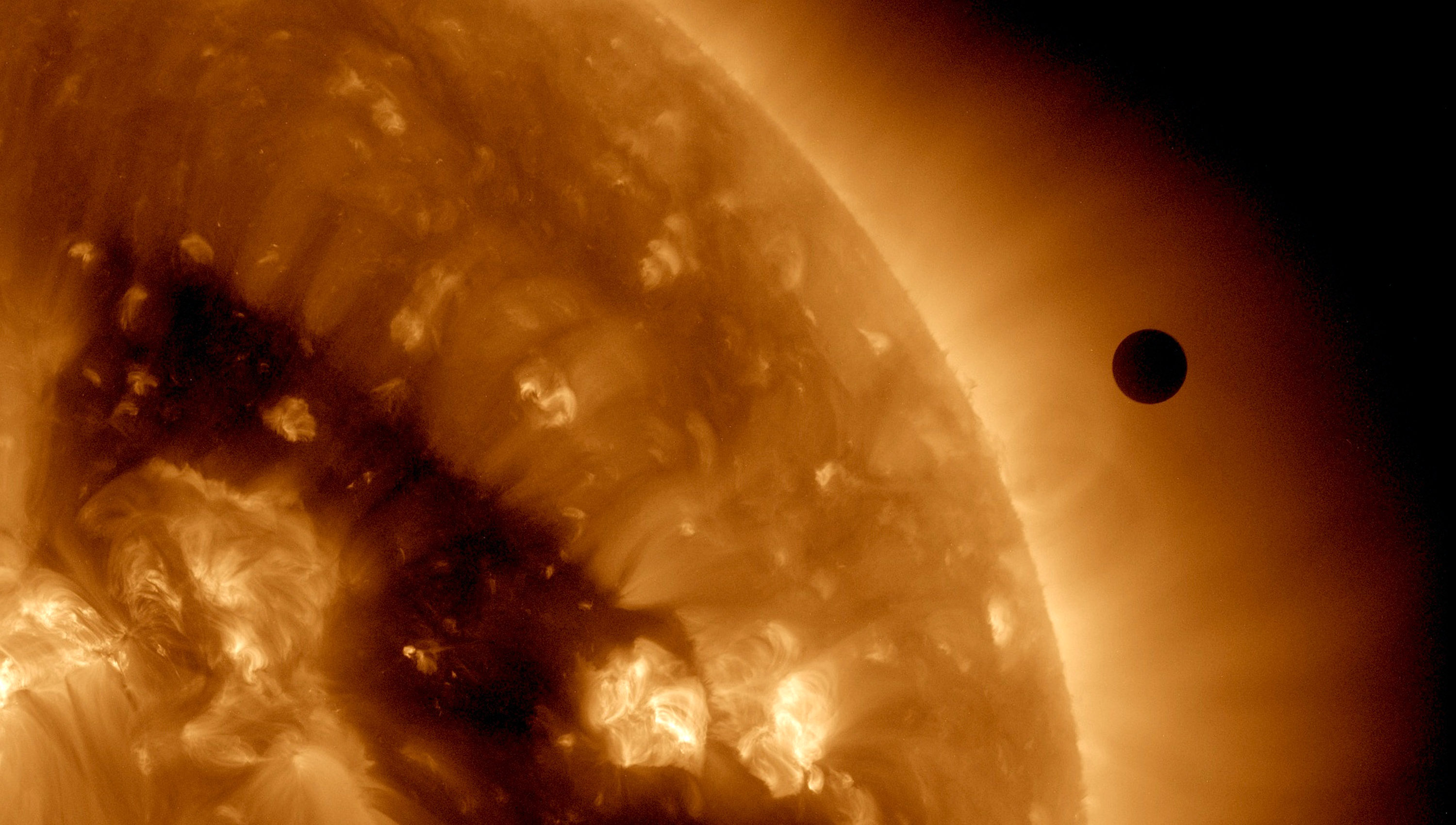 A satellite captures an ultra-high definition image of the transit of Venus across the face of the sun from space on June 6, 2012. (Credit: SDO/NASA via Getty Images)